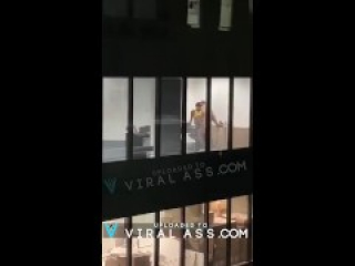 office employees caught having sex through window